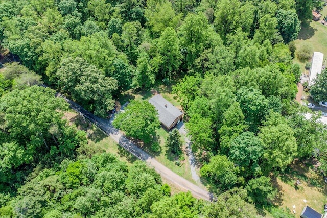 aerial overview of property's location with a forest