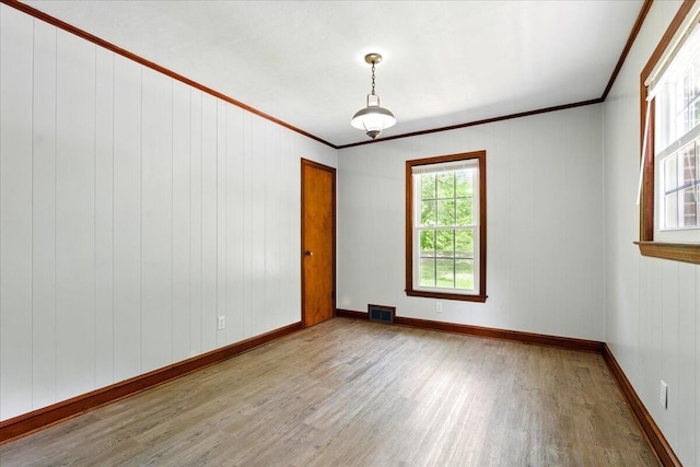 66 Adrian St, Bassett, VA 24055 - unfurnished room with wood finished floors, crown molding, and baseboards