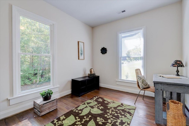 office area with wood finished floors and baseboards