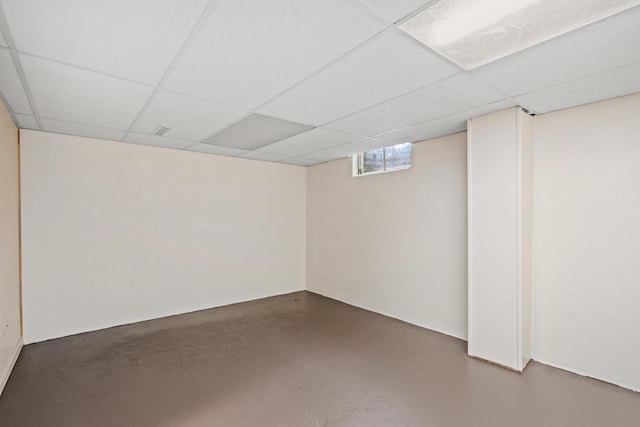 below grade area with a paneled ceiling