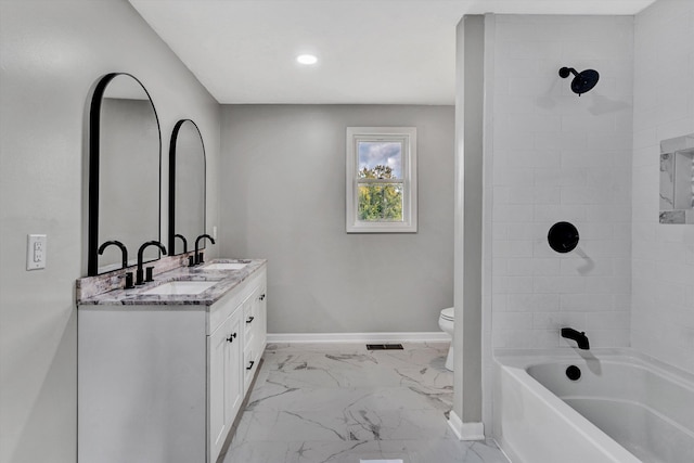 475 S Main St, Rocky Mount, VA 24151 - full bathroom with baseboards, marble finish floors, toilet, double vanity, and  shower combination