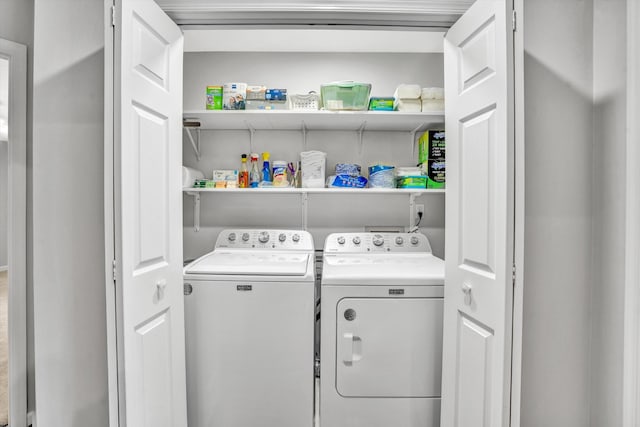 laundry area with washer and clothes dryer
