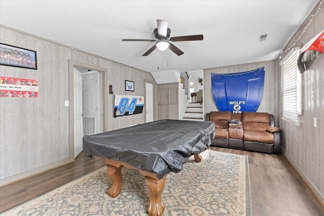 recreation room with wood finished floors, a ceiling fan, pool table, wood walls, and baseboards
