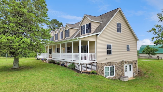 4178 Headens Bridge Rd, Bedford, VA 24523 - view of side of home with a yard, a porch, a shingled roof, and stone siding