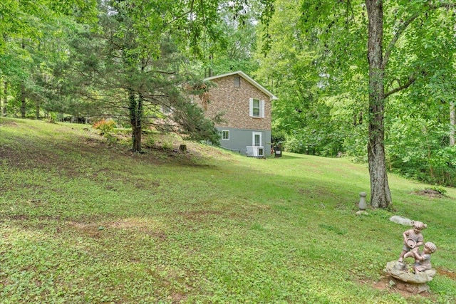 175 Webb Mountain Rd, Boones Mill, VA 24065 - view of grassy yard with cooling unit and a view of trees