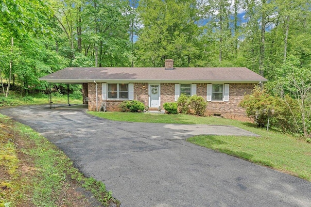 175 Webb Mountain Rd, Boones Mill, VA 24065 - ranch-style home featuring asphalt driveway, a chimney, brick siding, a front lawn, and a carport