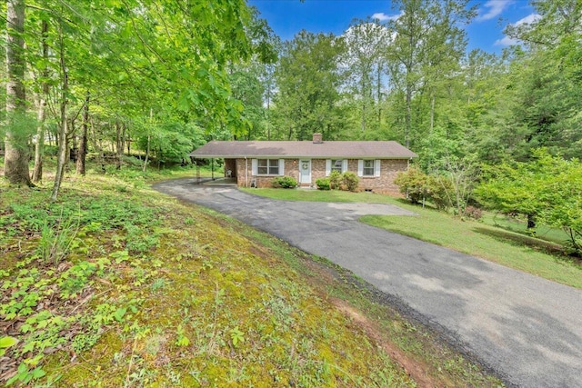 175 Webb Mountain Rd, Boones Mill, VA 24065 - single story home featuring driveway, a chimney, brick siding, and a front lawn
