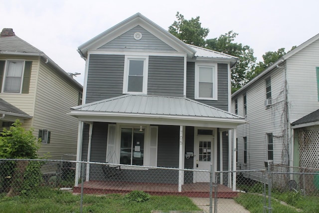 705 Rose Ave, Clifton Forge, VA 24422 - view of front of house with a porch and metal roof