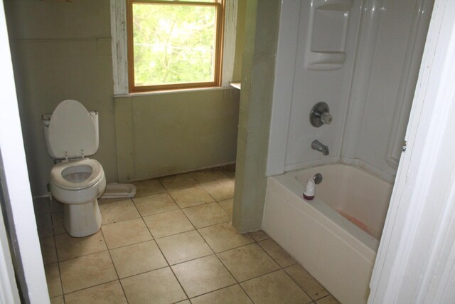 705 Rose Ave, Clifton Forge, VA 24422 - full bath featuring toilet, tile patterned floors, and shower / bathtub combination