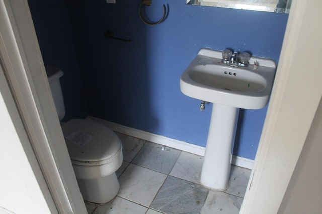 705 Rose Ave, Clifton Forge, VA 24422 - half bathroom with toilet