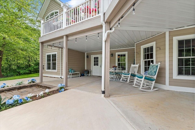 view of patio / terrace with a balcony