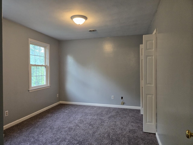 100 View Dr, Goodview, VA 24095 - unfurnished room featuring dark colored carpet and baseboards