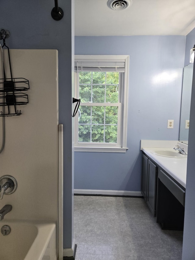100 View Dr, Goodview, VA 24095 - bathroom with baseboards, vanity, and shower / washtub combination