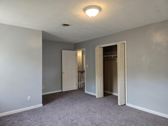 100 View Dr, Goodview, VA 24095 - unfurnished bedroom with carpet flooring, baseboards, and a closet