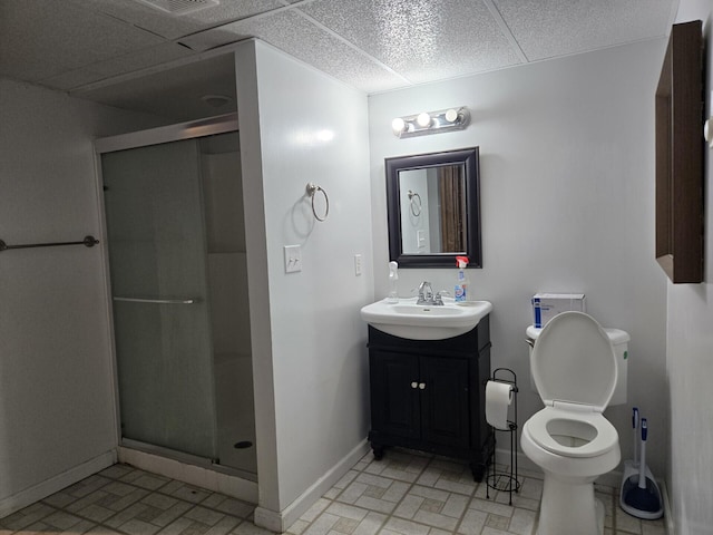 100 View Dr, Goodview, VA 24095 - full bathroom with baseboards, a shower stall, vanity, toilet, and brick patterned floors