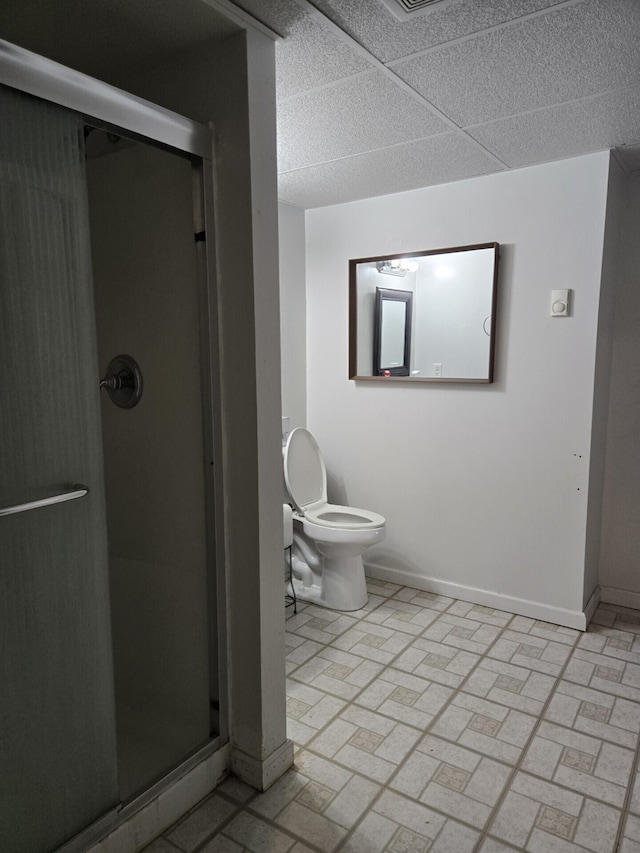 100 View Dr, Goodview, VA 24095 - bathroom featuring a stall shower, baseboards, brick patterned flooring, and toilet