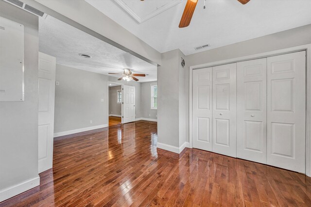 1841 Old Franklin Tpke, Rocky Mount, VA 24151 - unfurnished living room featuring a ceiling fan, hardwood / wood-style floors, and baseboards