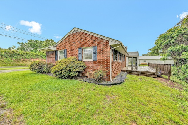 1841 Old Franklin Tpke, Rocky Mount, VA 24151 - view of property exterior featuring brick siding, a yard, and a deck