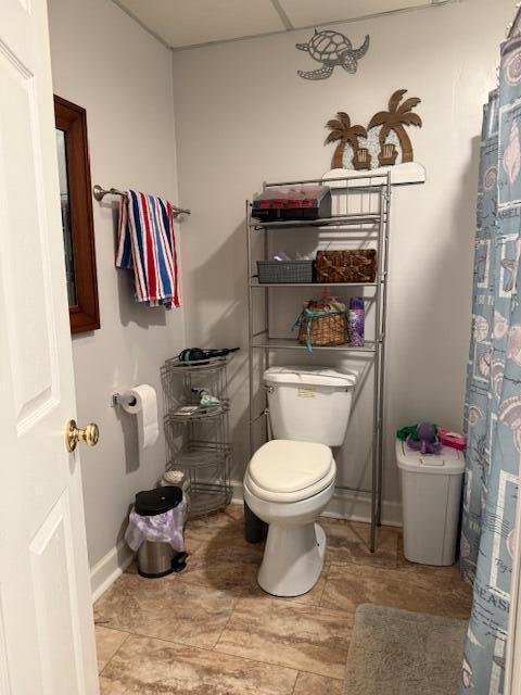 1134 Coolbrook Rd, Bedford, VA 24523 - full bathroom featuring toilet, baseboards, a shower with curtain, and tile patterned flooring