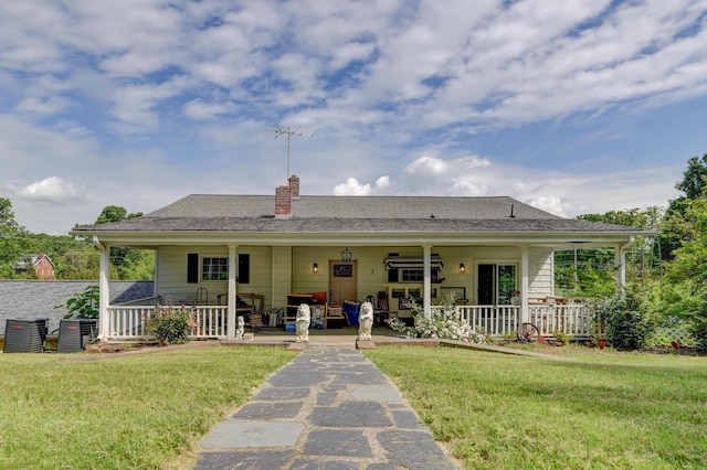 2770 W Lynchburg Salem Tpke, Bedford, VA 24523 - rear view of property with covered porch, a yard, and a chimney