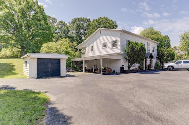 2770 W Lynchburg Salem Tpke, Bedford, VA 24523 - view of home's exterior with an outbuilding and a lawn