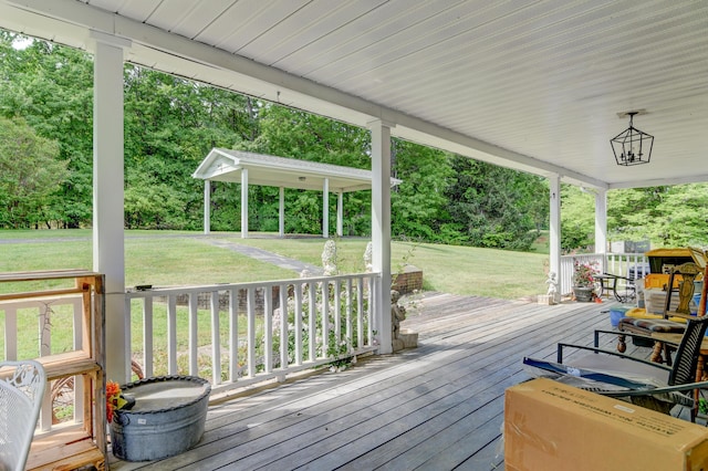 2770 W Lynchburg Salem Tpke, Bedford, VA 24523 - wooden terrace featuring a lawn, covered porch, and view of scattered trees