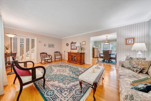 6553 Pencheck Cir, Roanoke, VA 24018 - living area with ornamental molding, light wood-style floors, and wallpapered walls