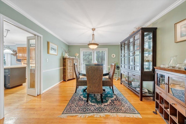 6553 Pencheck Cir, Roanoke, VA 24018 - dining room featuring crown molding, light wood-style floors, and baseboards