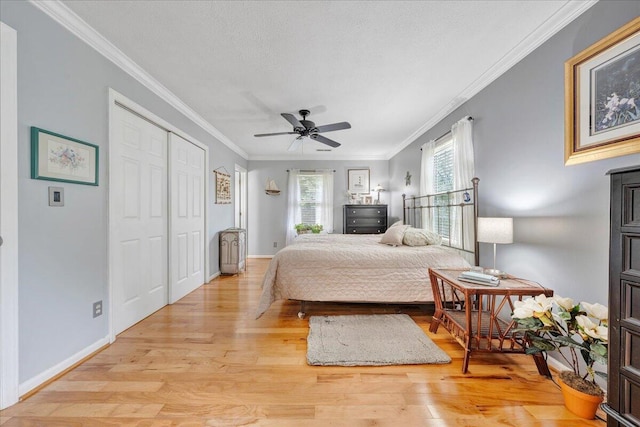 6553 Pencheck Cir, Roanoke, VA 24018 - bedroom featuring light wood-type flooring, crown molding, baseboards, and a ceiling fan