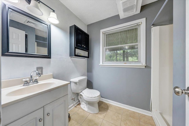 6553 Pencheck Cir, Roanoke, VA 24018 - full bathroom with baseboards, toilet, tile patterned floors, vanity, and a textured ceiling