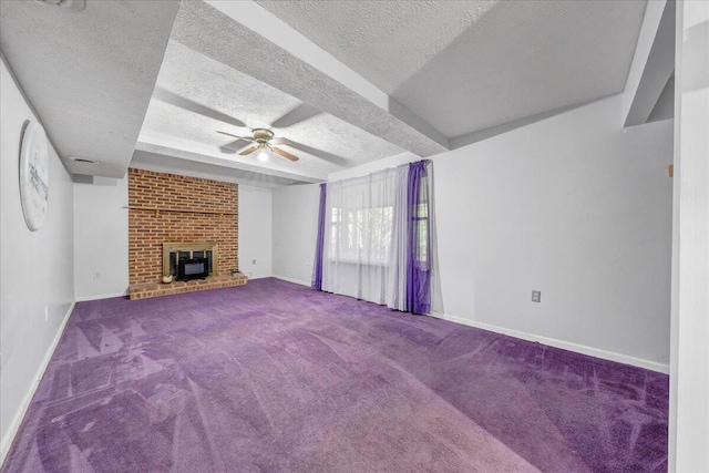 6553 Pencheck Cir, Roanoke, VA 24018 - unfurnished living room with a textured ceiling, carpet flooring, ceiling fan, baseboards, and a fireplace