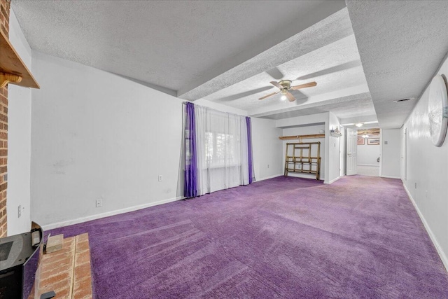 6553 Pencheck Cir, Roanoke, VA 24018 - unfurnished living room with a textured ceiling, a ceiling fan, carpet floors, and baseboards