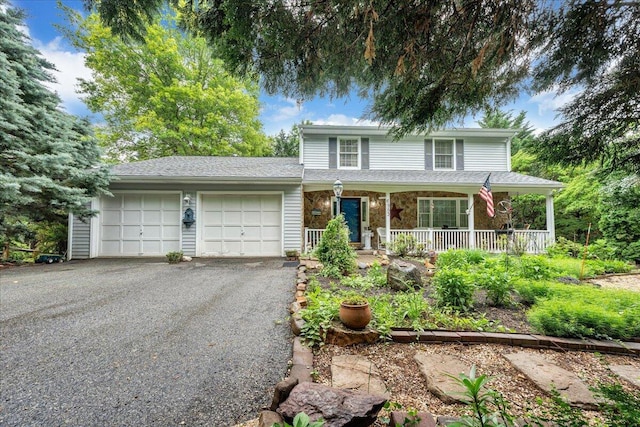 6553 Pencheck Cir, Roanoke, VA 24018 - traditional-style home with a garage, a porch, and driveway