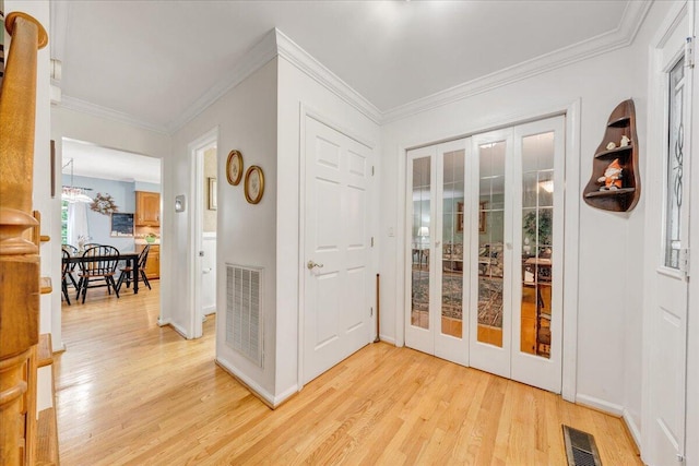 6553 Pencheck Cir, Roanoke, VA 24018 - foyer entrance featuring light wood-style flooring and crown molding