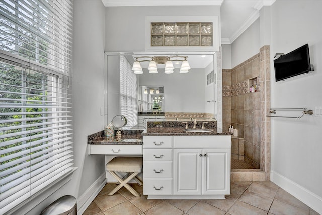 full bath with plenty of natural light, baseboards, tile patterned floors, a walk in shower, and crown molding