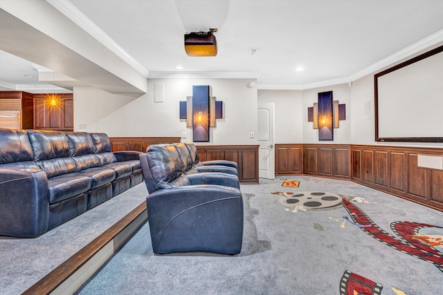 cinema room with carpet flooring, crown molding, wainscoting, recessed lighting, and wooden walls