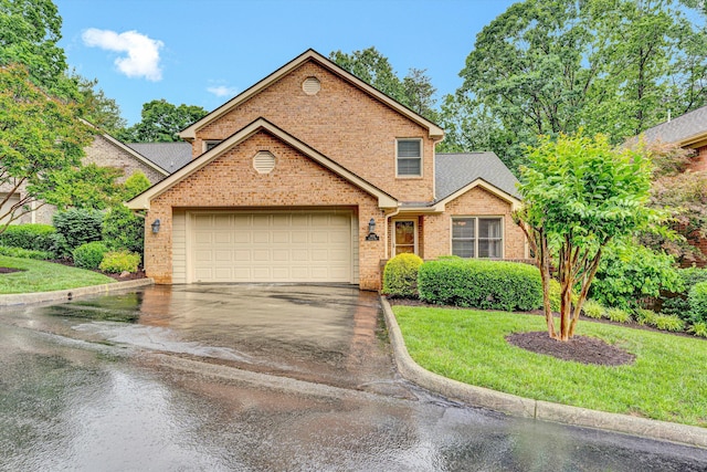 view of front of home featuring driveway, brick siding, an attached garage, a front lawn, and roof with shingles