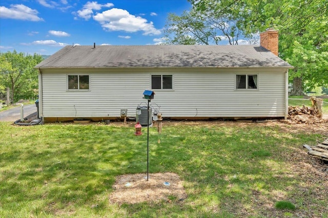 81 Ridgeview Cir, Roanoke, VA 24019 - view of property exterior with a chimney and central air condition unit