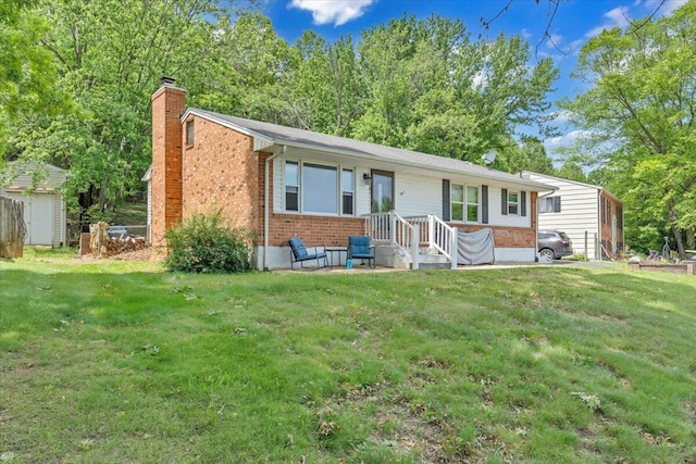 81 Ridgeview Cir, Roanoke, VA 24019 - single story home featuring a chimney, brick siding, and a front yard