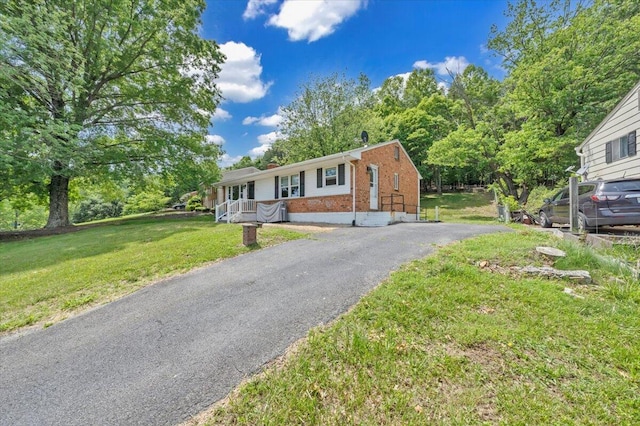 81 Ridgeview Cir, Roanoke, VA 24019 - single story home with brick siding, a front lawn, and driveway