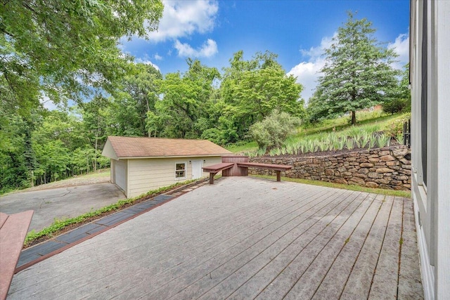 deck featuring an outbuilding