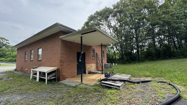 1050 Ashwell Cir, Huddleston, VA 24104 - view of side of property with brick siding
