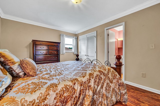 3643 Larson Ln, Roanoke, VA 24018 - bedroom featuring a closet, crown molding, wood finished floors, and baseboards