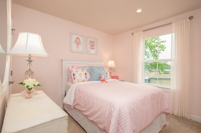 bedroom featuring light colored carpet and recessed lighting