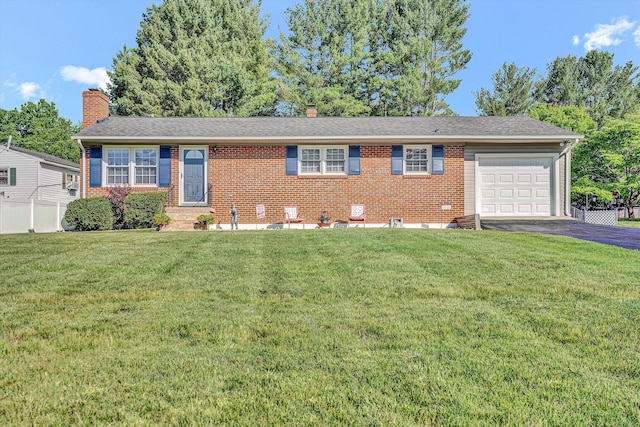 93 SW Ave, Buchanan, VA 24066 - ranch-style house with a chimney, asphalt driveway, an attached garage, brick siding, and roof with shingles