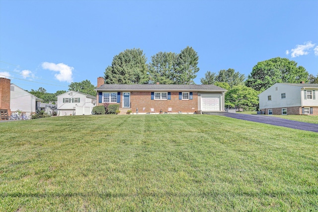 93 SW Ave, Buchanan, VA 24066 - ranch-style home featuring driveway, brick siding, a chimney, and a front yard