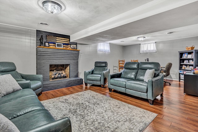 93 SW Ave, Buchanan, VA 24066 - living room with wood finished floors and a fireplace