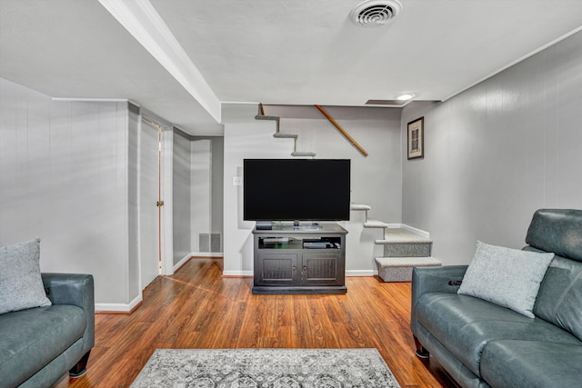 93 SW Ave, Buchanan, VA 24066 - living room featuring wood finished floors and baseboards