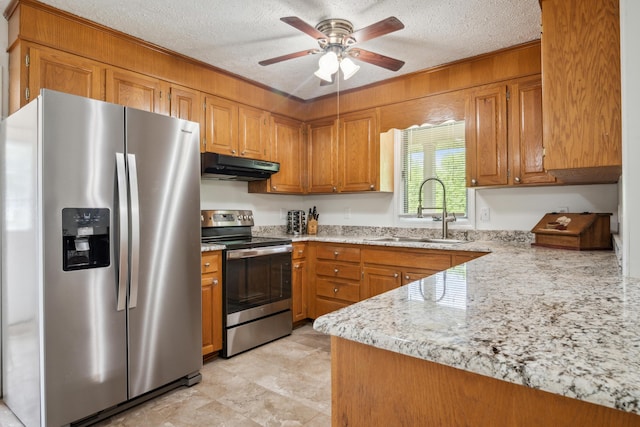 2844 Forage Rd, Shawsville, VA 24162 - kitchen with stainless steel appliances, a sink, under cabinet range hood, ceiling fan, and brown cabinets