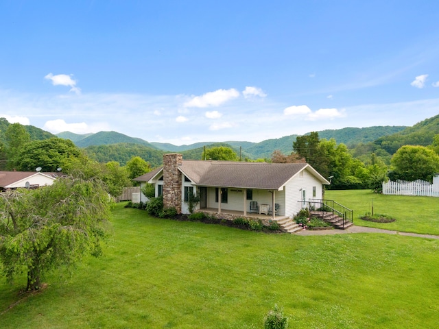 2844 Forage Rd, Shawsville, VA 24162 - view of front of home with a chimney, a mountain view, and a porch